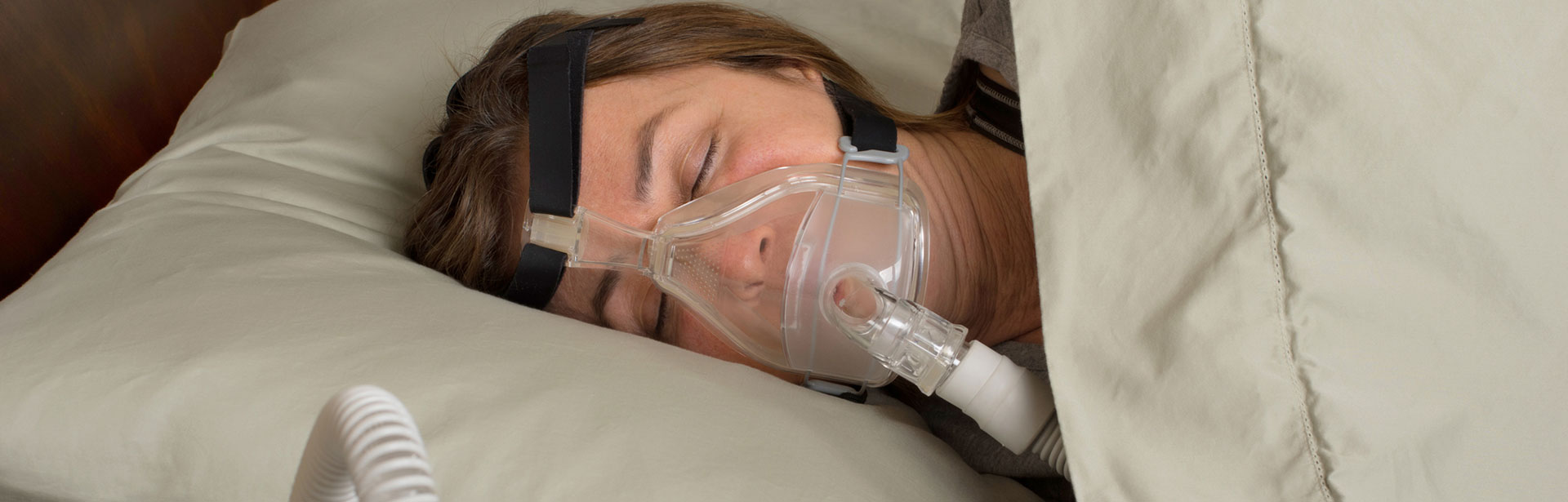 Woman sleeping after Sleep Apnea treatments