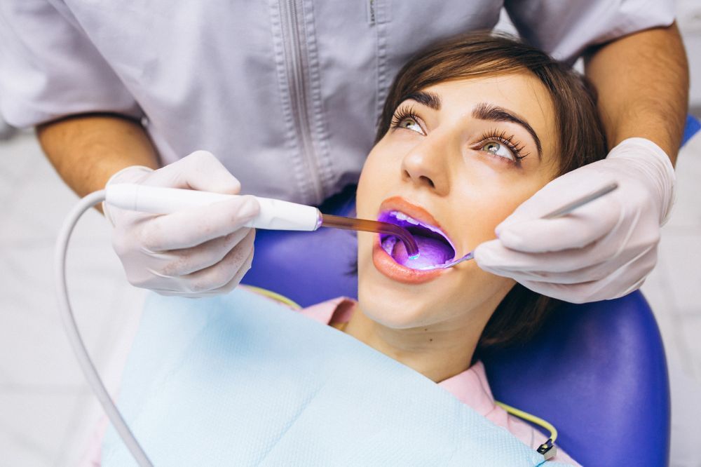 a women is getting dental treatment
